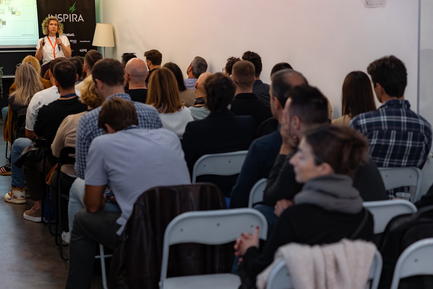 Full audience watching a talk at Roadmaps 2025