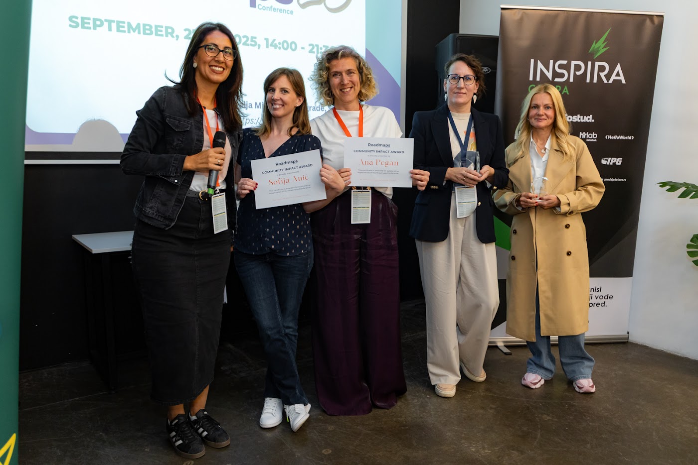 Speakers receiving certificates at Roadmaps 2025